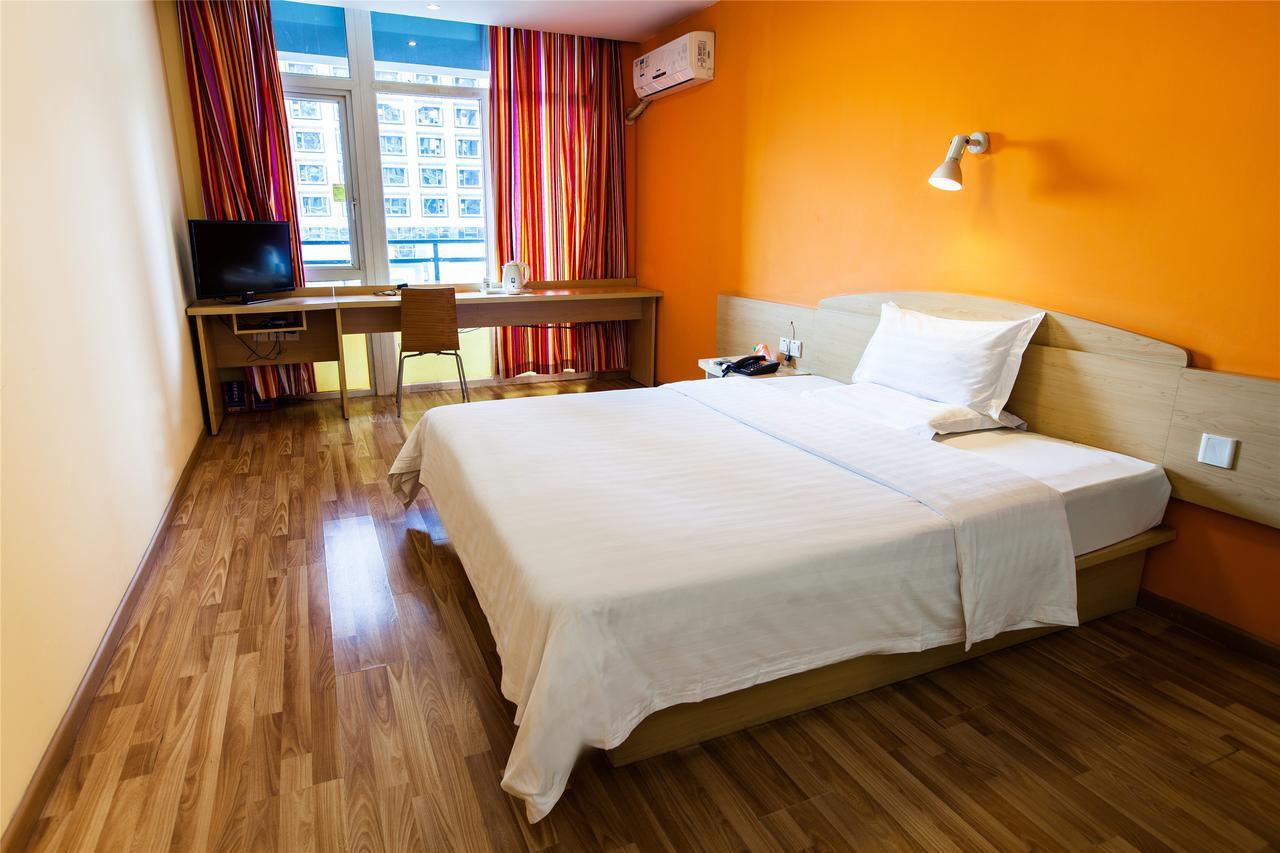 7Days Premium Guangzhou Tianhe Gangding Гуанчжоу Номер фото